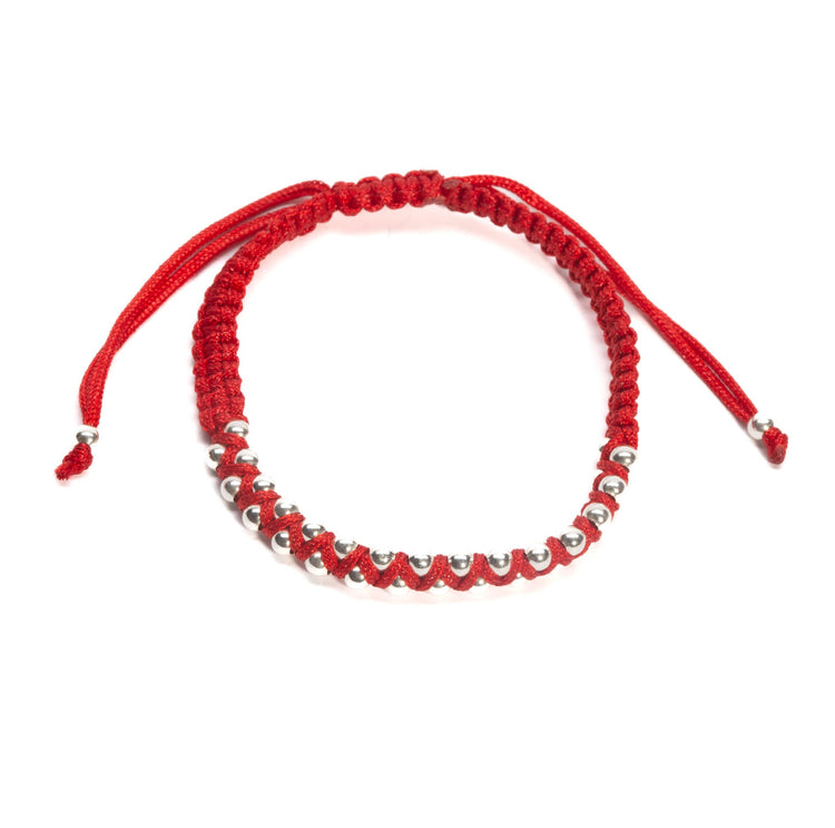 Pulsera de hilo con esferas de plata. de plata mexicana