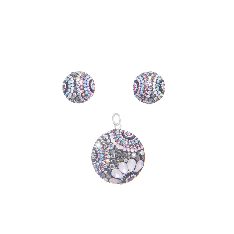 Dije y aretes circular de plata con zirconias y cristales