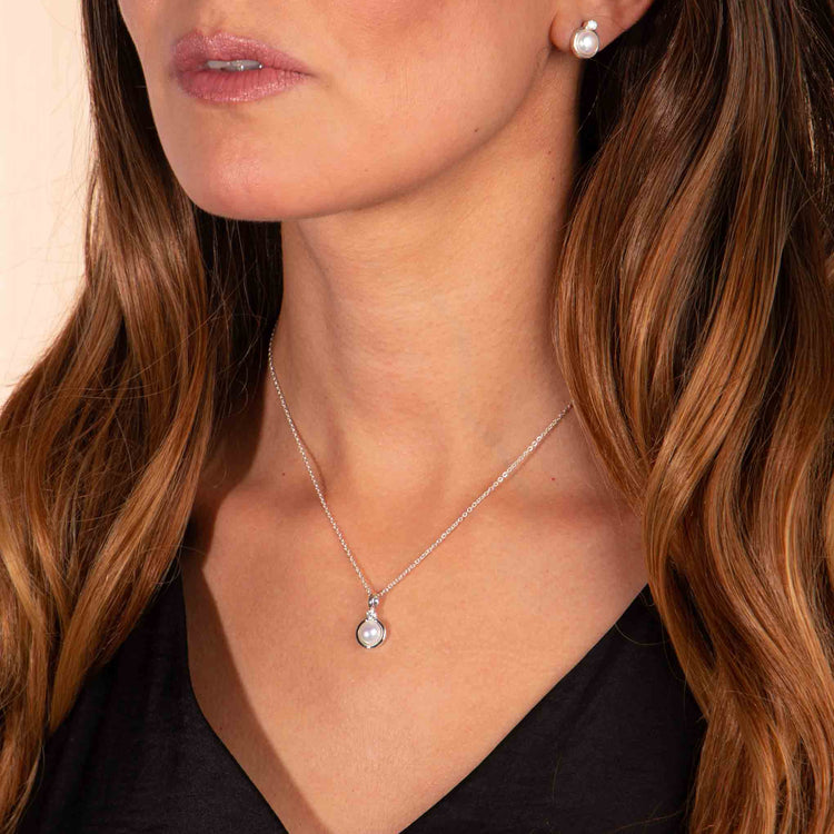 Dije y aretes de Plata con perlas y zirconias