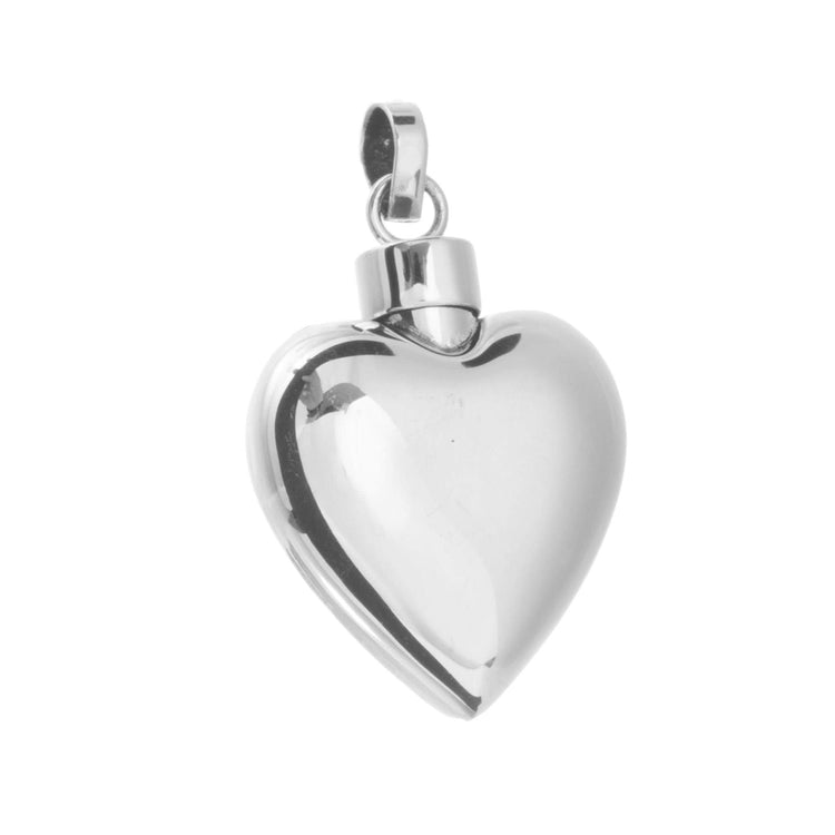 Relicario corazon bombeado de plata mexicana