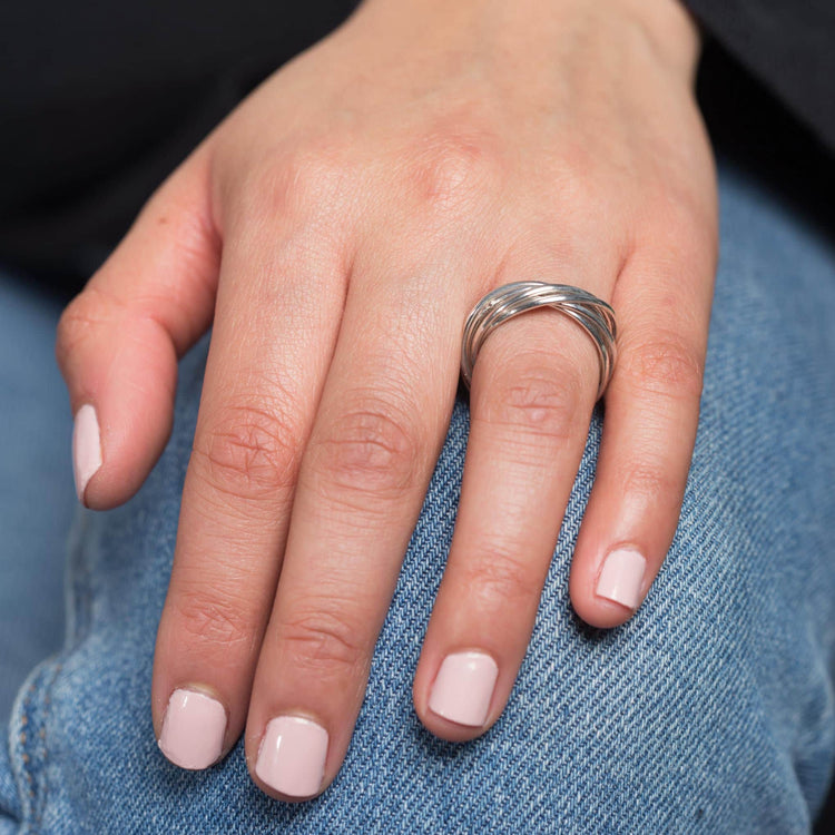 Anillo semanario entrelazado  de plata mexicana