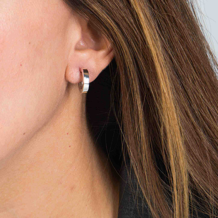 Oval silver hoop earrings