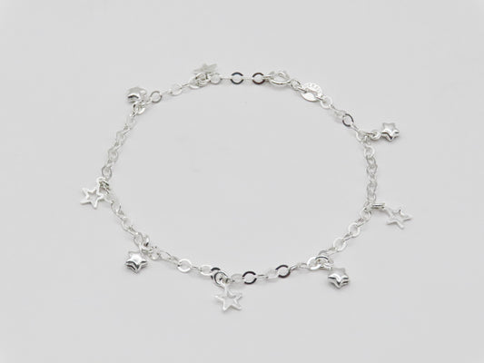 Pulsera de plata con estrellas colgantes