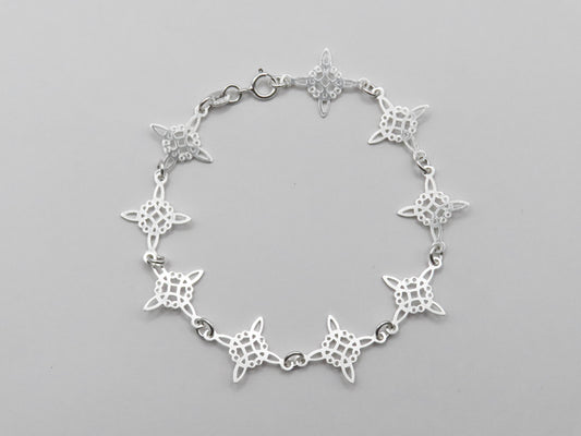 Pulsera nudos de bruja consecutivos de plata