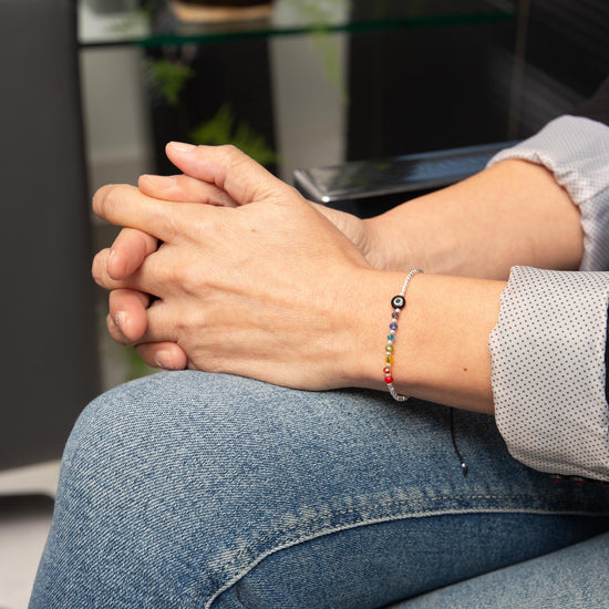 Pulsera de hilo con ojo turco, cristalitos y bolitas de plata de plata mexicana