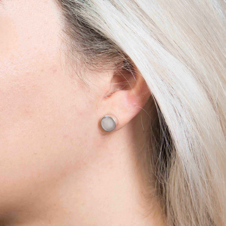 Aretes forma de botón de plata