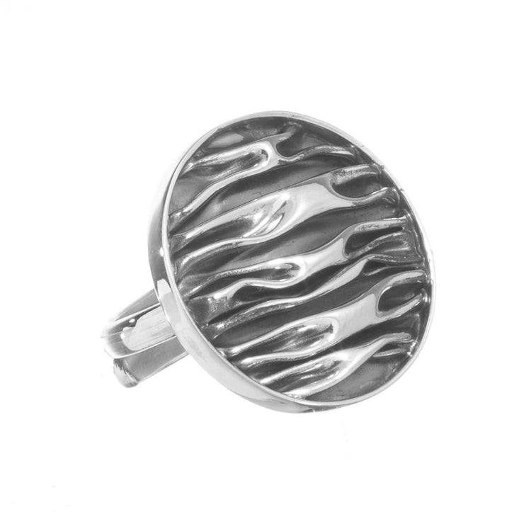 Anillo circular de plata pavonada